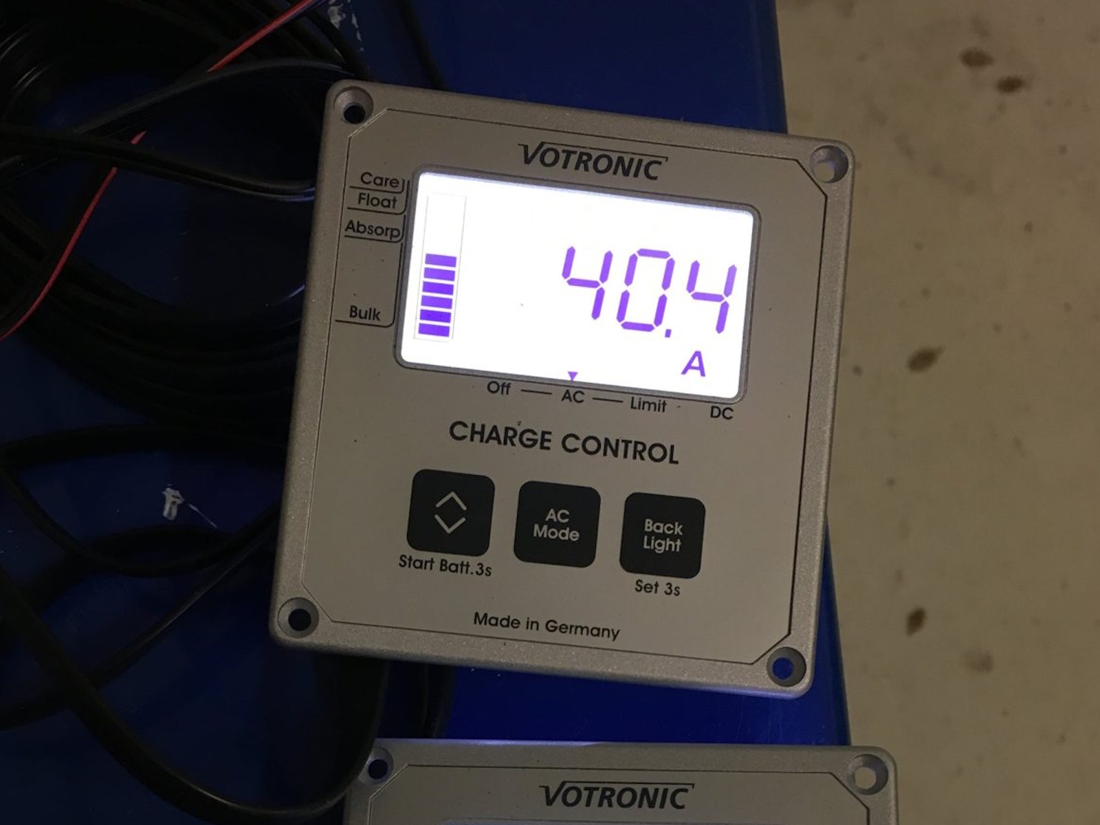 Two Votronic displays on a workbench, the charge control showing 40.4 amps