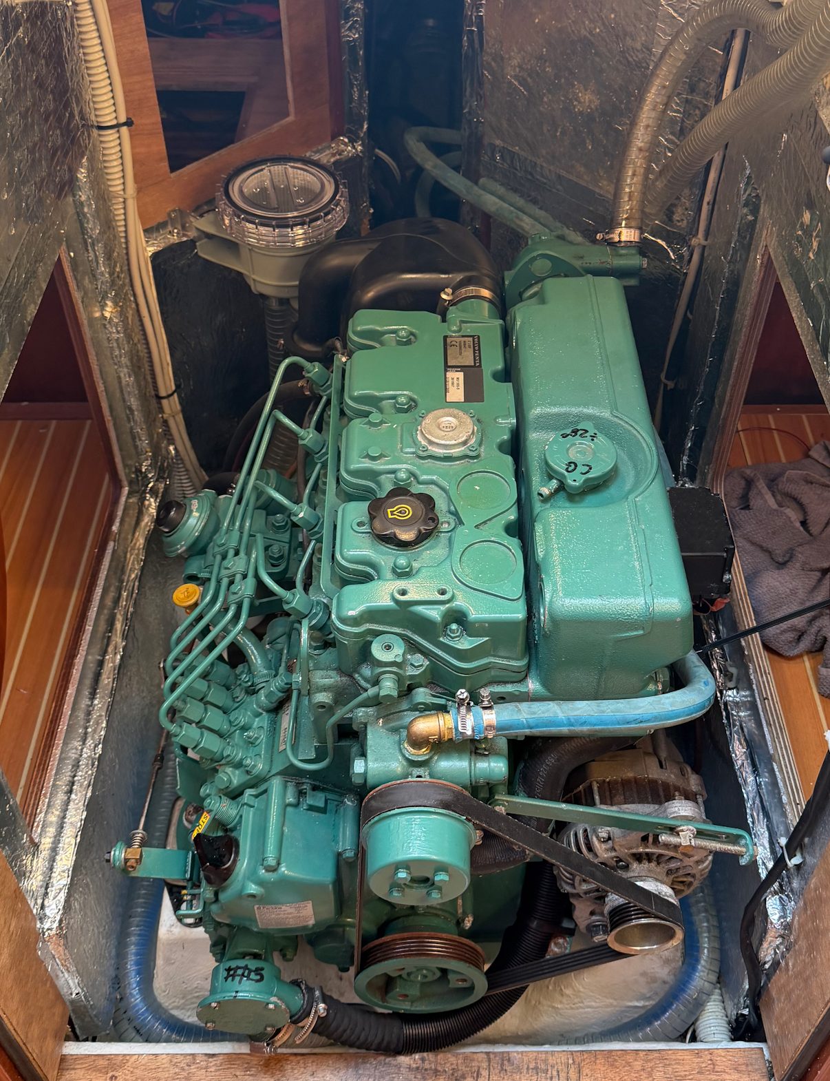 The diesel engine installed in the sailboat's engine bay